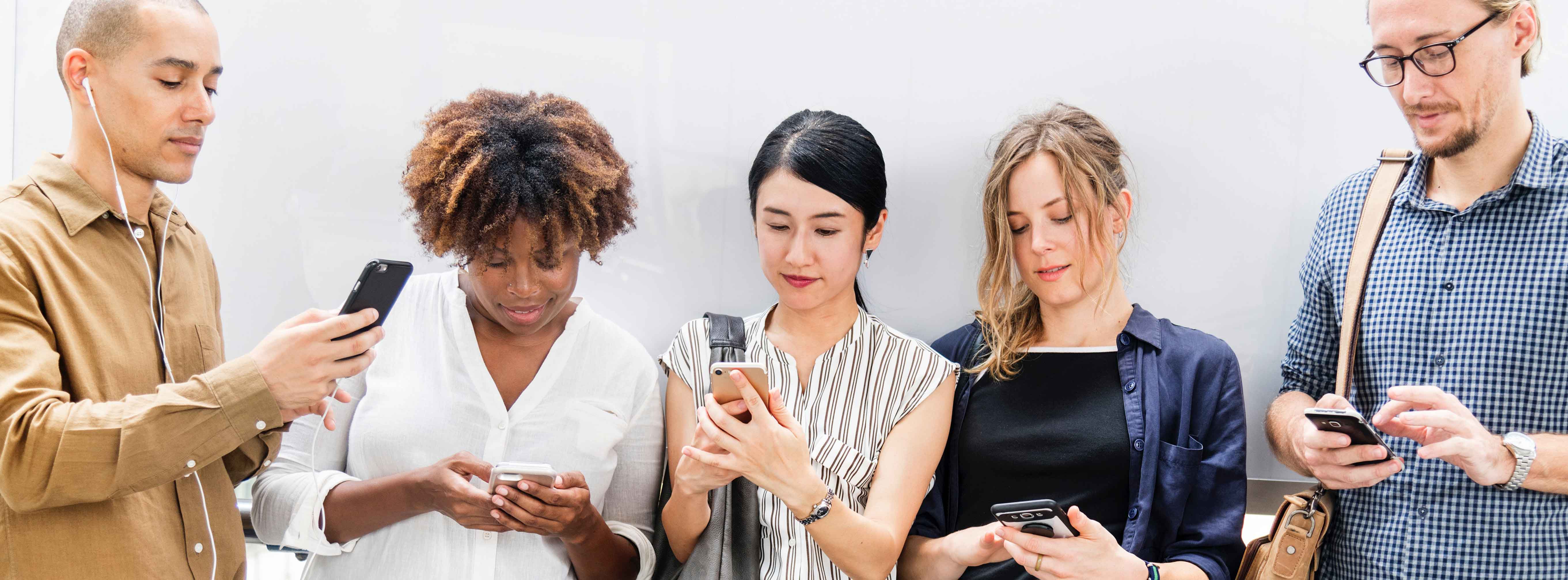 Picture of 5 people using cell phones