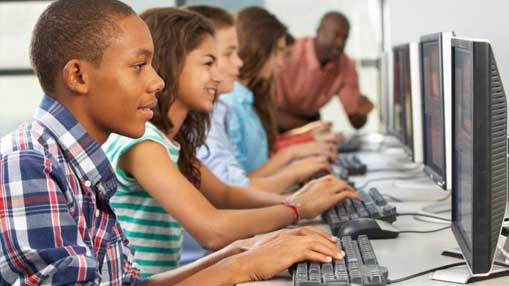 Picture of Children using computers in a room