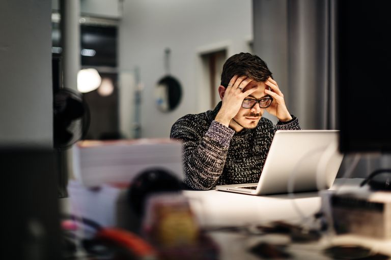 Picture of Shocked man using computer